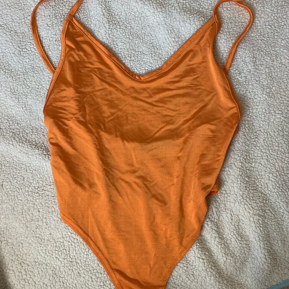 Orange bodysuit